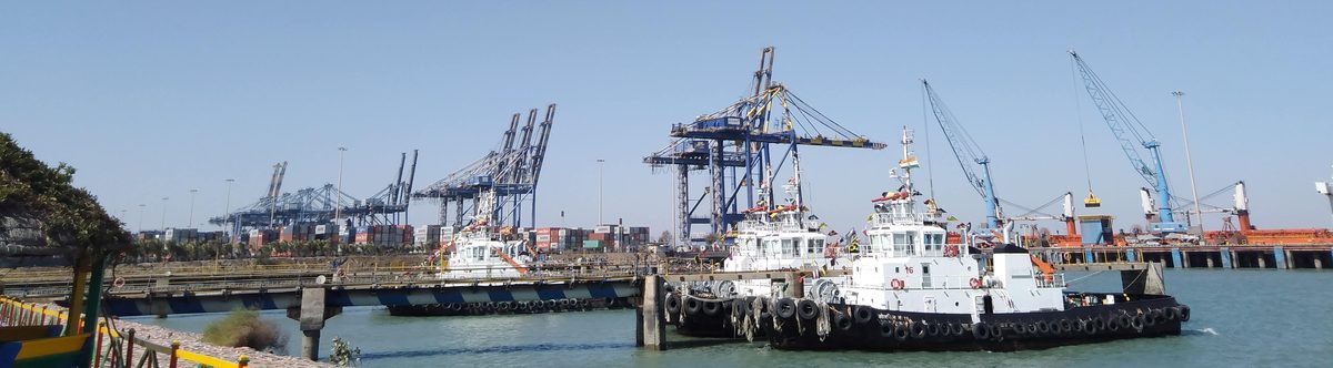 Container ship at port with cranes
